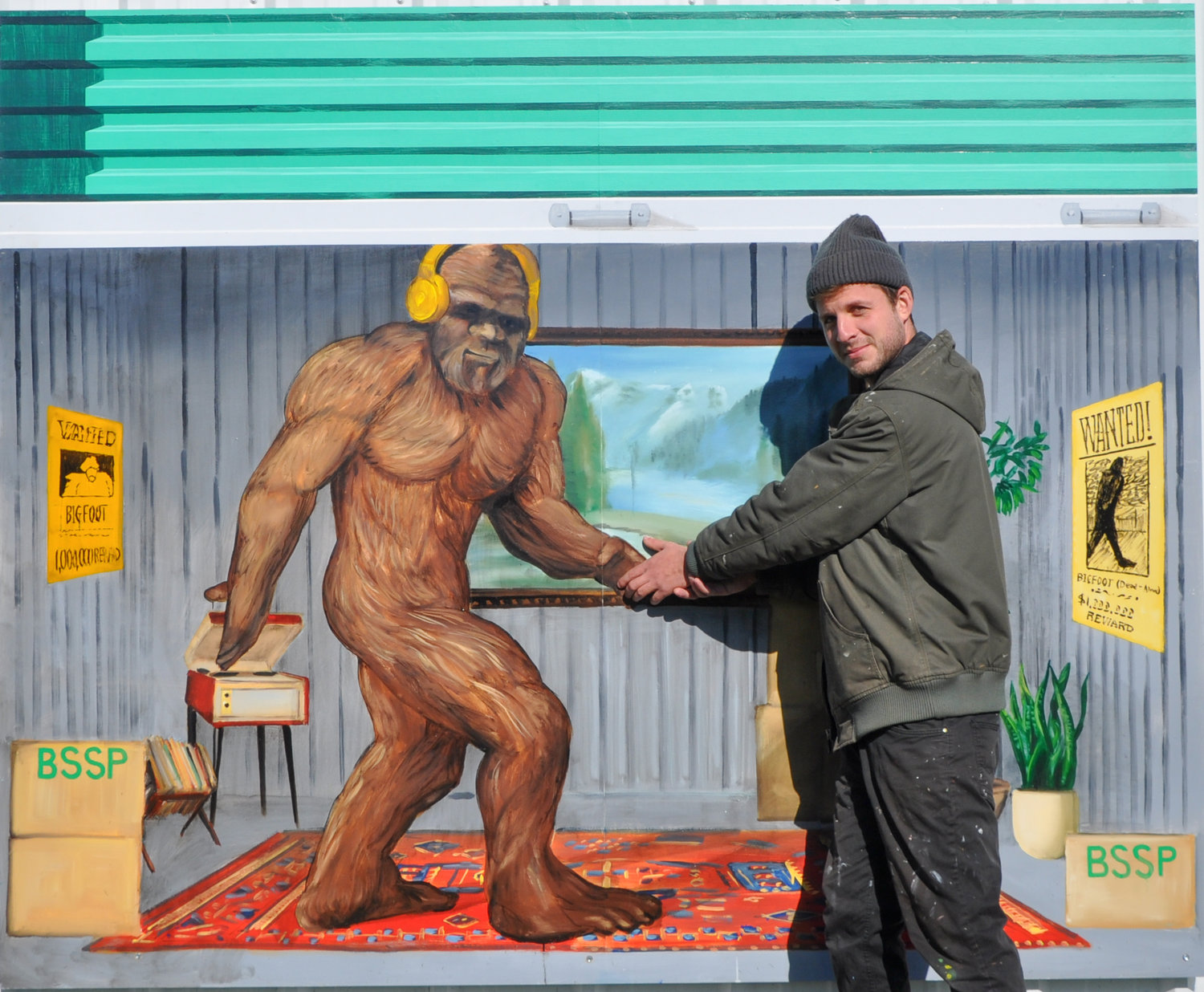 Muralist David Barnett congratulates Bigfoot on eluding capture at the Bethel Storage Park on Rt 17B. Check it out, but keep your eyes on the road!